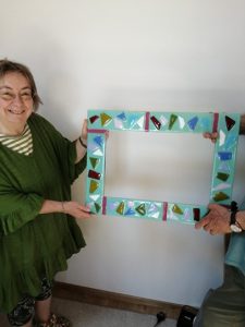 Student with completed mirror